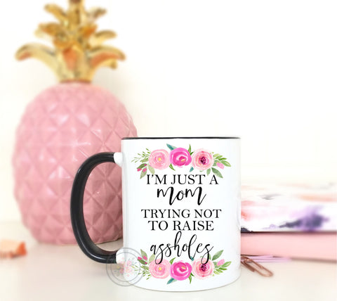 I'm Just A Mom Trying Not To Raise A*sholes Coffee Mug